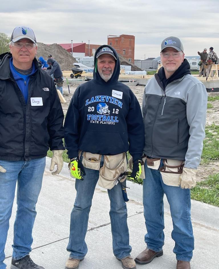 Doug, Steve, and Mark volunteer at the Columbus Habitat for Humanity